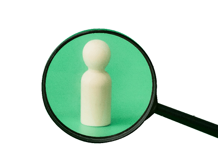 Wooden doll with Magnifying glass. Representing finding talent positions for various purposes.  Human Resource Management and Recruitment and Hiring concept. Find leader. Find team.